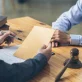 businessman and lawyer discuss the contract document treaty of the law sign a contract business lawyer concept free photo 1